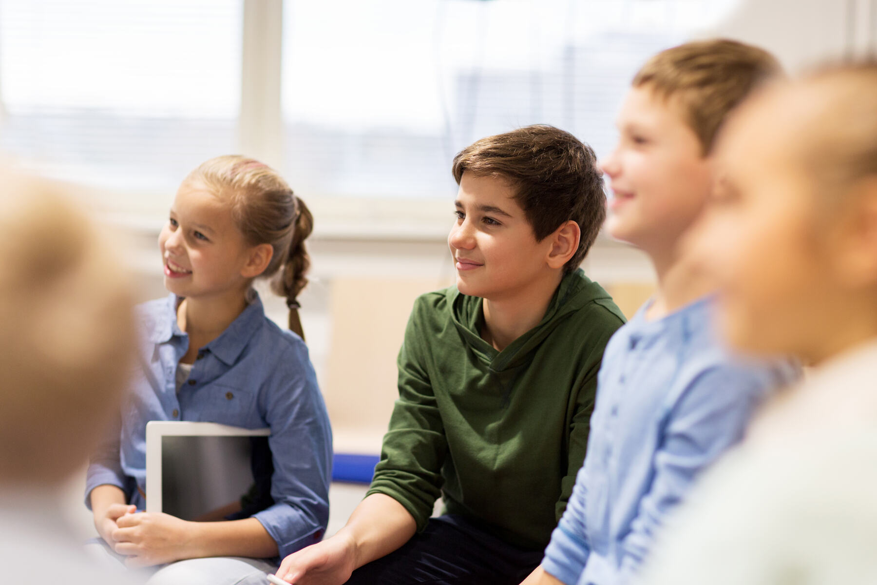 Young students learning together at school